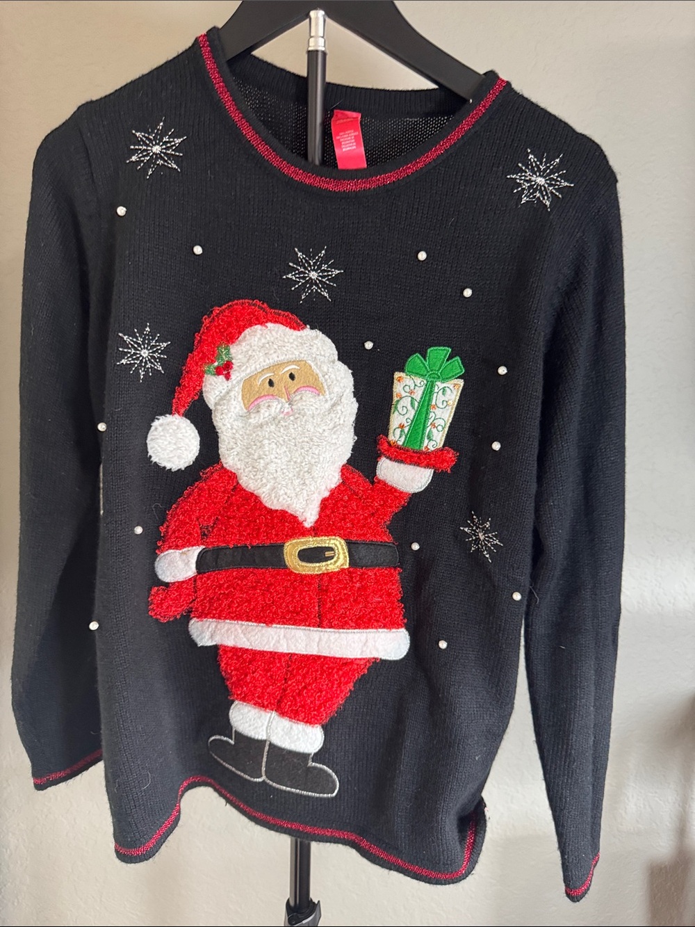 Women's Black Christmas Sweater with Santa Graphic
